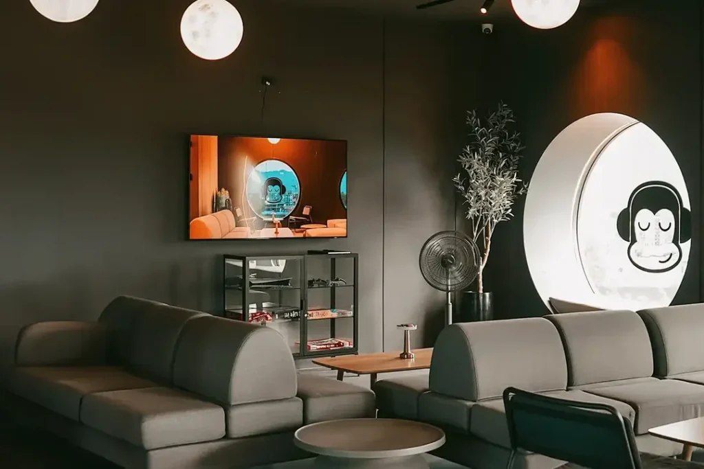 Blu Monkey lounge with branded wall artwork and seating